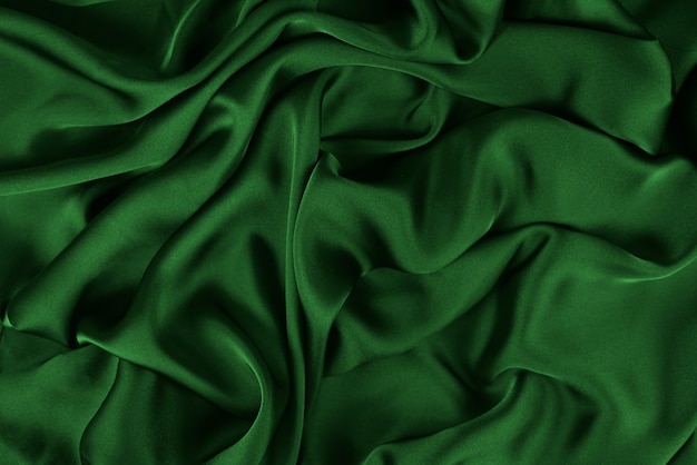 Silk or satin luxury fabric texture can use as abstract background. Top view.