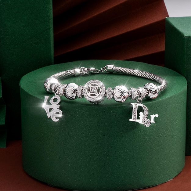 A silver bracelet with the word love on it