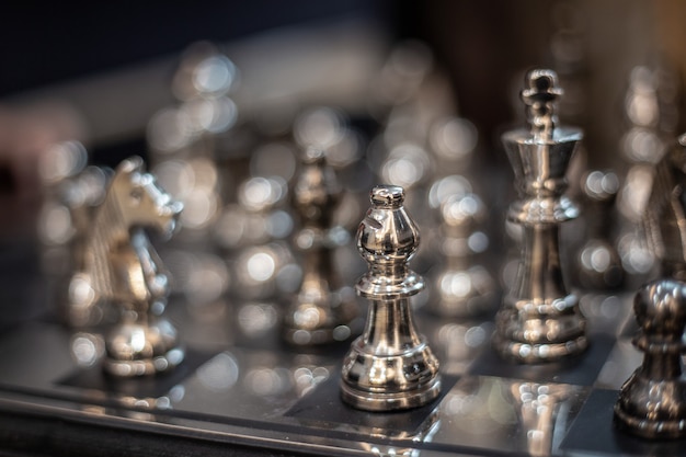 Silver chess model on board strategic game 