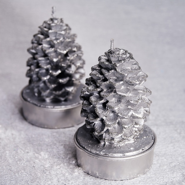 Silver christmas candles in the for form of cones