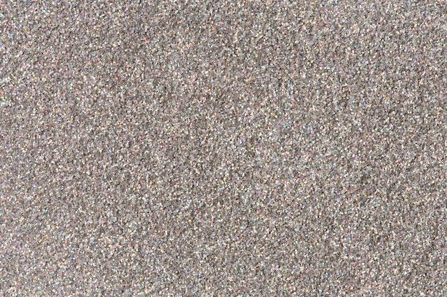 Silver colored sparkly background. High resolution photo.