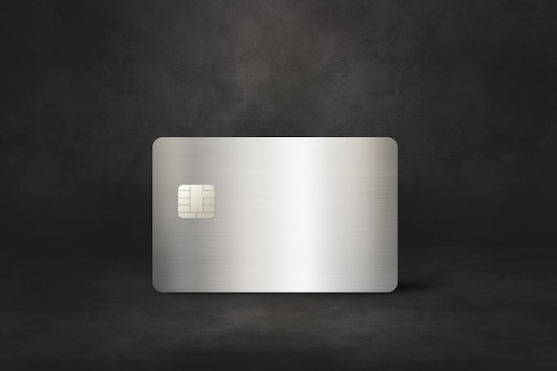 Silver credit card template on a black concrete