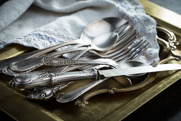 Silver dishes on old surface