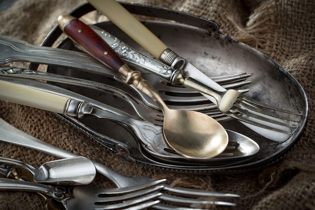 Silver dishes on old surface