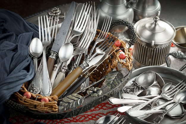 Silver dishes on old surface