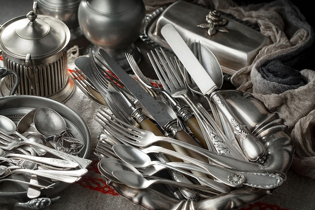 Silver dishes on old surface