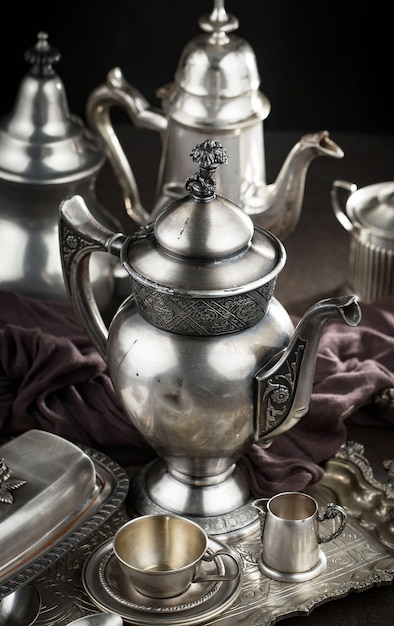 Silver dishes on old surface