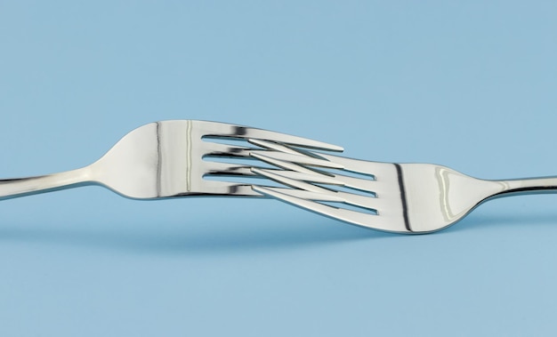 Silver forks connected