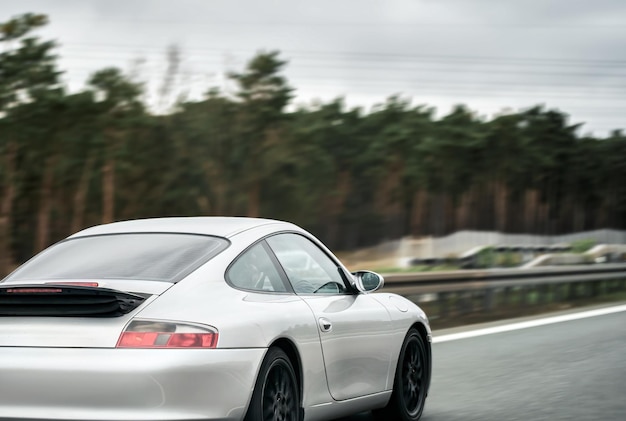 Silver German Roadster Coupe Exquisite Speed and Style on the Majestic Highway Modern European Sportcar