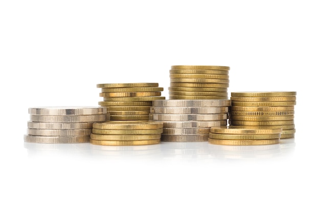 silver and glod coin stack. town. pile. isolated on white background