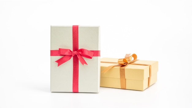 Silver and gold gift box on a white background.