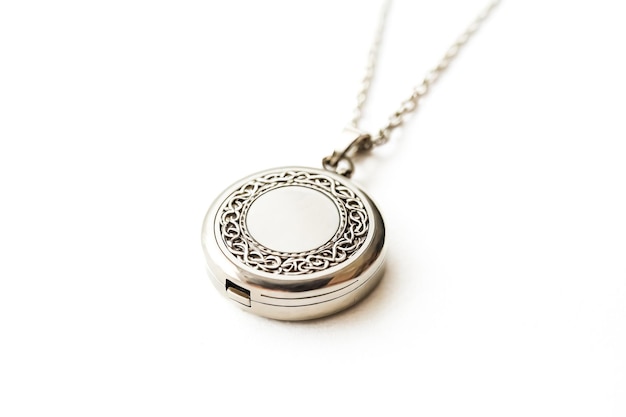 Photo silver locket necklace on white background