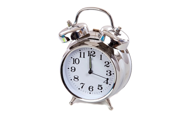 Silvered clock on a over white background