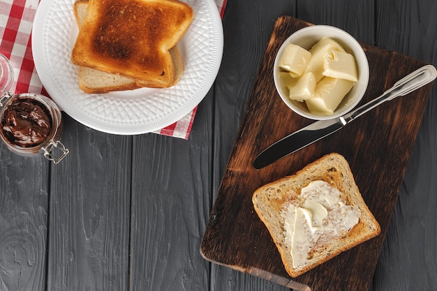 Simple breakfast. Toasted bread covered with butter