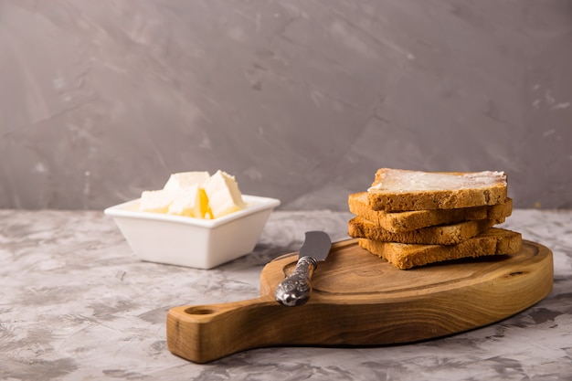 Simple breakfast of traditional products - buttered toast