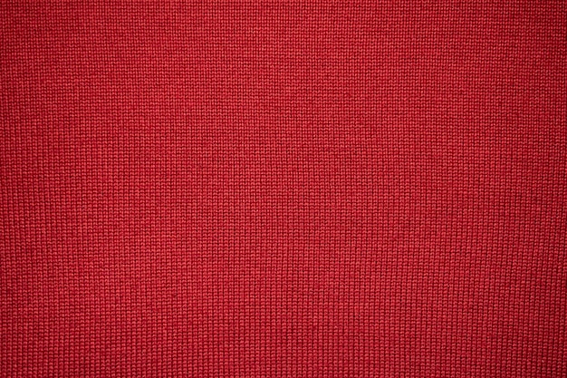 simple red background texture of canvas close up