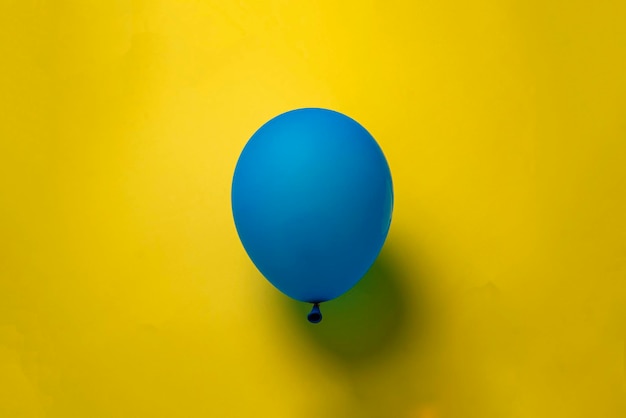 A simple single color balloon isolated on pastel background