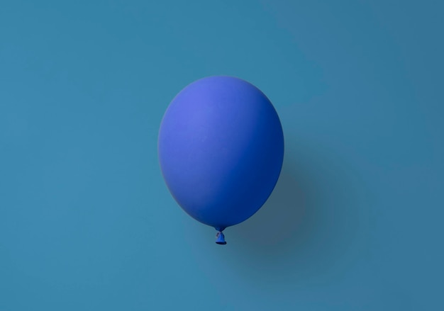 A simple single color balloon isolated on pastel background