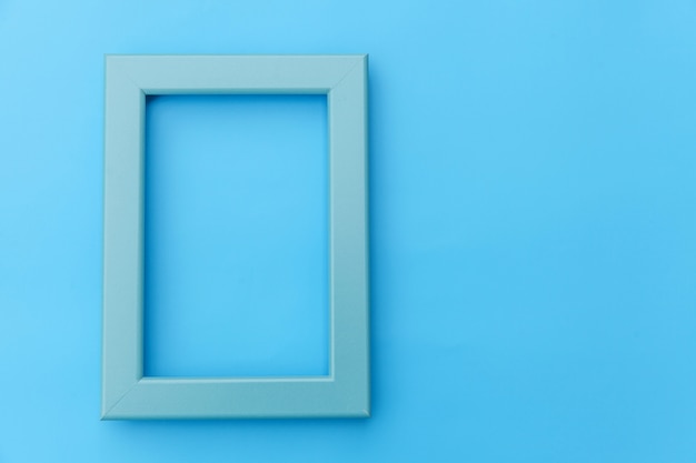 Simply design with empty blue frame isolated on blue pastel colorful background