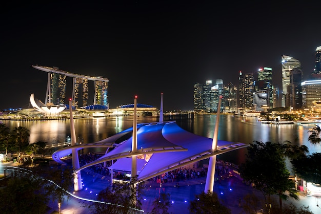 Singapore business district skyline in night at Marina Bay, Singapore.