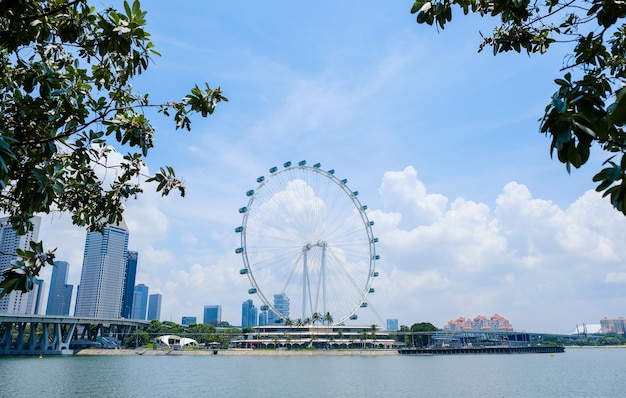 Singapore flyer, ferris wheel in sunny day, tourist attraction