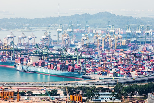 SINGAPORE - OCTOBER 18, 2014: The port of Singapore. It's the world's busiest transshipment port and the world's second busiest port in terms 
of total shipping tonnage.