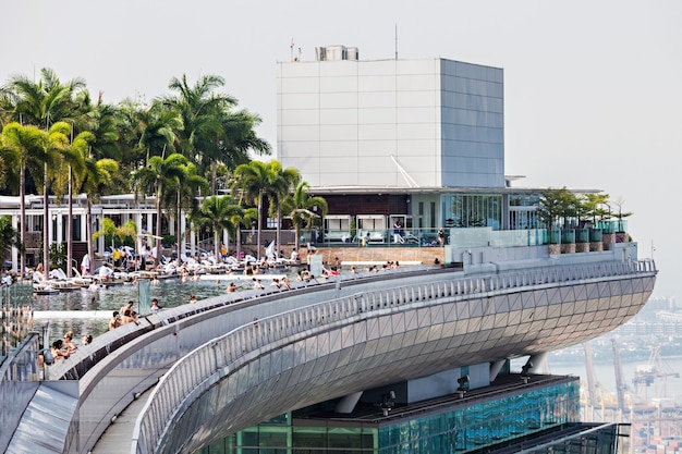 SINGAPORE - OCTOBER 18, 2014: A view of the Infinity Pool of the Skypark that tops the Marina Bay Sands Hotel.