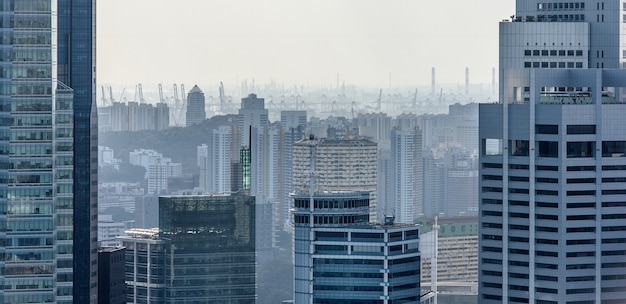 Singapore skyscrapers and port in a distance