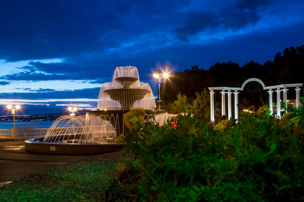 Singing fountain on the promenade of Gelendzhik at sunset