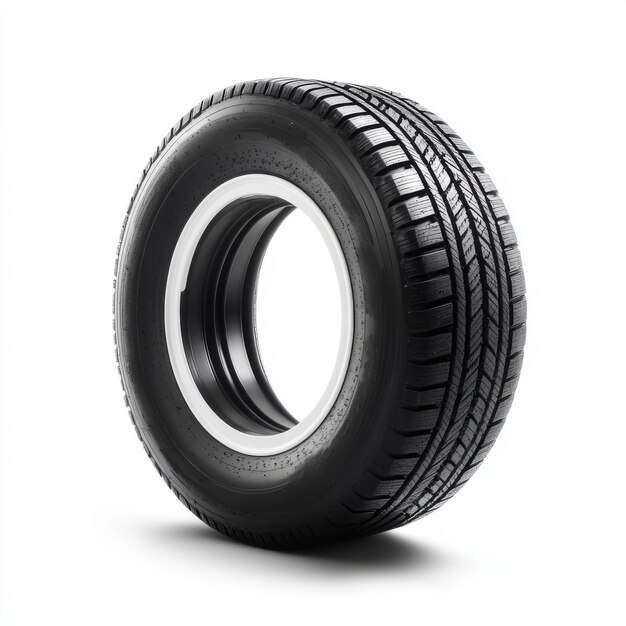 Photo a single black car tire displayed against a white background highlighting its tread pattern and smooth surface