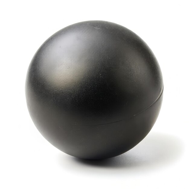 Photo a single black rubber ball isolated against a white background generative ai