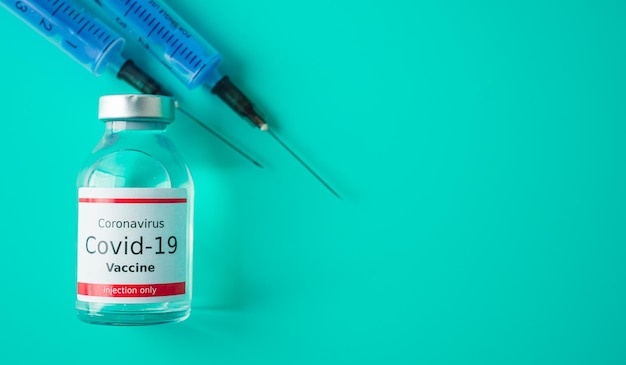 A single bottle vial of Covid19 vaccine Medical concept vaccination hypodermic injection treatment Vaccine and syringe injection