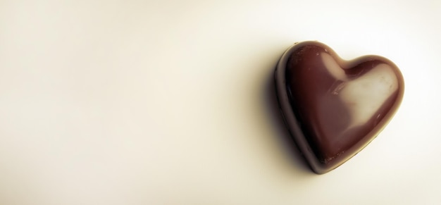 single dark chocolate in the shape of heart for valentines day