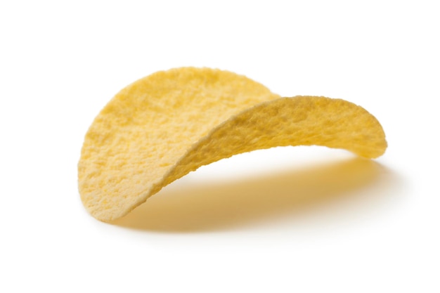 Single deep fried potato chip close up on white background