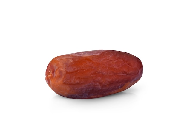 Single dried date fruit from low perspective on white space.