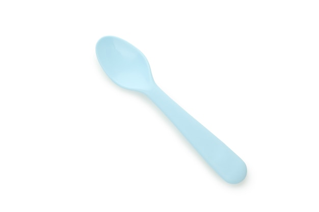 Single plastic spoon isolated on white background