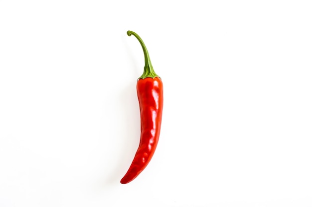 Single Red Chilli Pepper On White Background