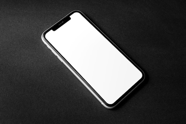 Single smartphone screen mockup above flat paper texture by real photography