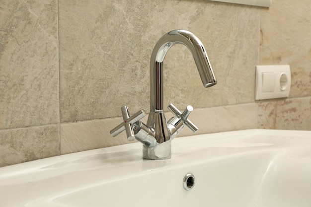 Sink and faucet in modern bathroom