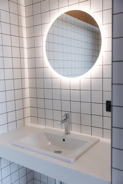 Sink and mirror in the bathroom element of interirior