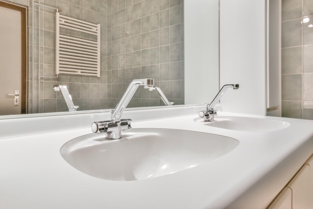 Sink and mirror in modern bathroom