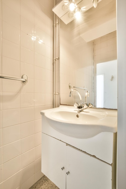 Sink and mirror in modern bathroom