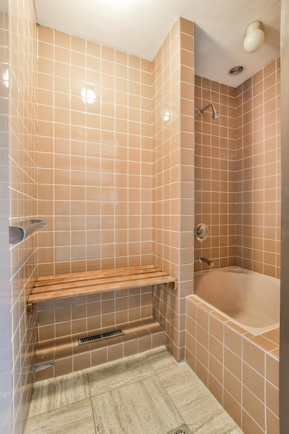 Sinks and bathtub near shower cabin