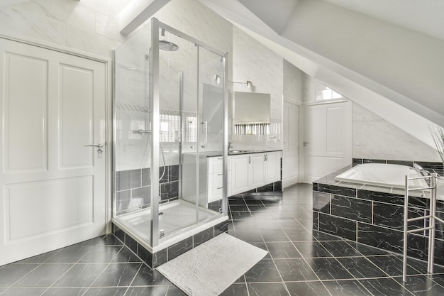 Sinks and bathtub near shower cabin