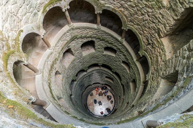 SINTRA PORTUGAL october 25 2017 People visiting The Initiation well of Quinta da Regaleira in Sintra Portugal