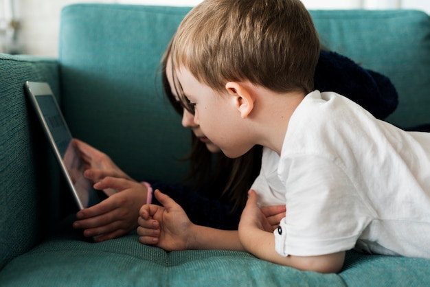 Sister Brother Playing Techie Digital Device