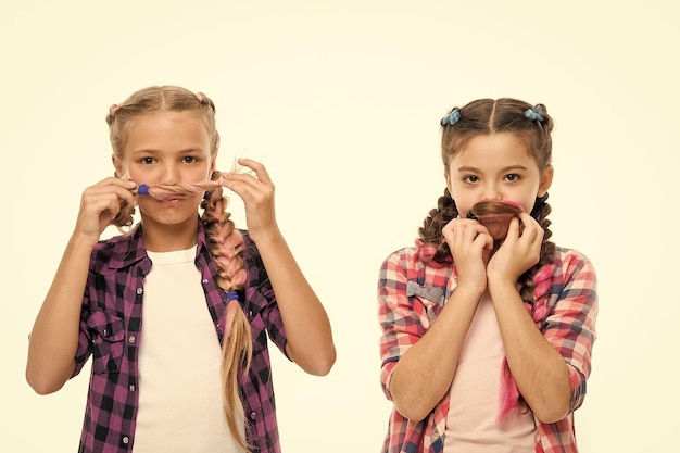 Sisterhood goals Sisters together isolated white background Sisterly relationship Sisterhood is unconditional love Girls playful sisters having fun with long hair Haircare and hairstyle concept