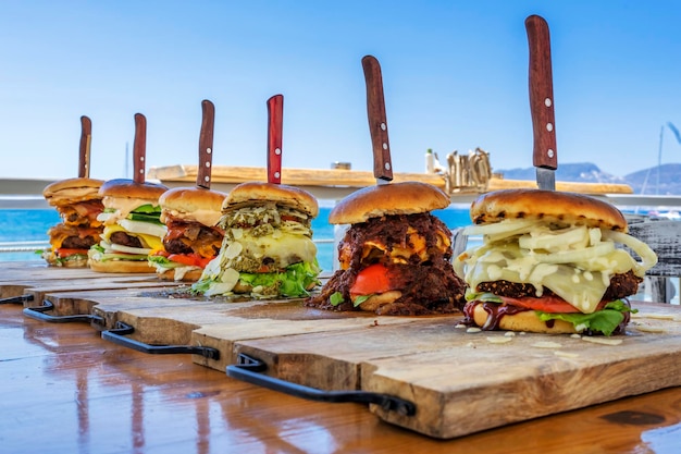 Six big burger on a table