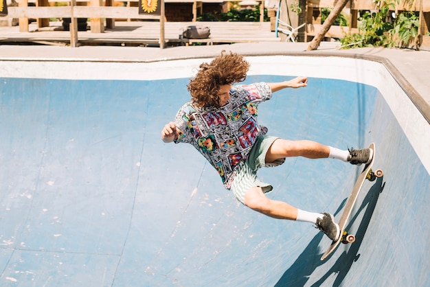 Skateboarder riding unsafe in ramp