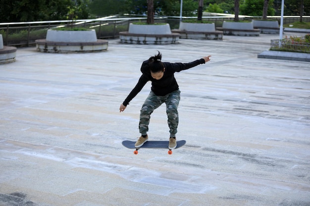 Skateboarder skateboarding outdoors in city